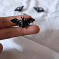 Eclipse Elegance Bat Ring