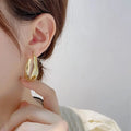 Mini Gold Wavy Hoop | Woman Earrings Sophisticated Golden Geometric Ladibelle