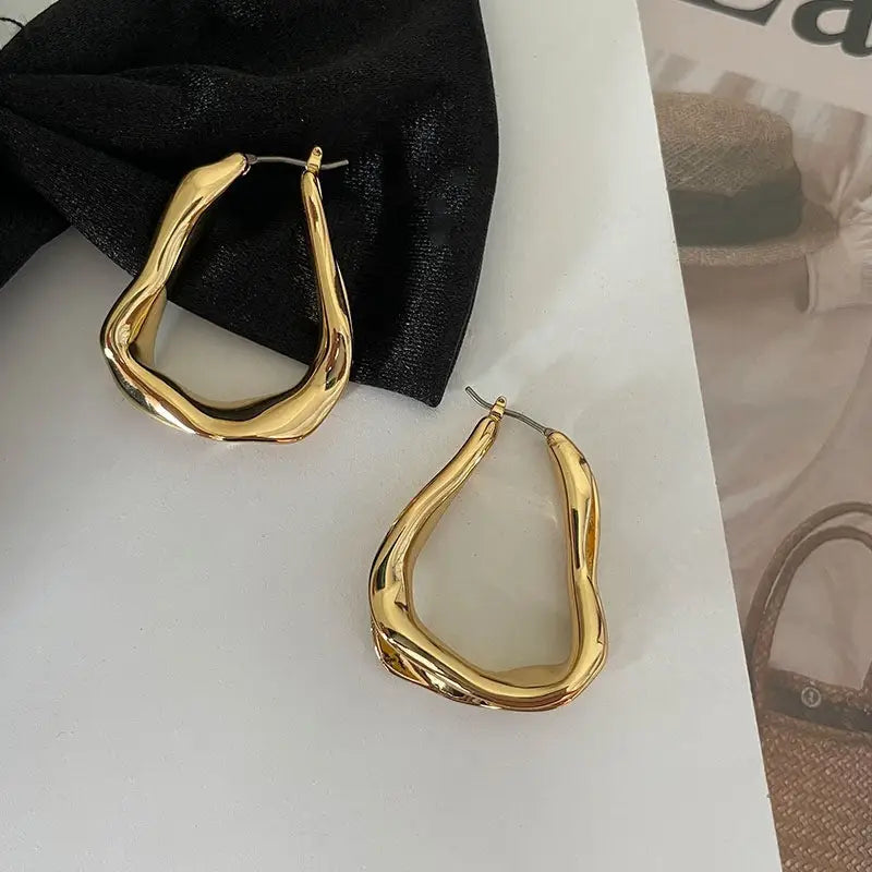 Mini Gold Wavy Hoop | Woman Earrings Sophisticated Golden Geometric Ladibelle