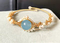 Sapphire Gleam Pearl Bracelet: Gilded Elegance - Bracelet