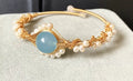 Sapphire Gleam Pearl Bracelet: Gilded Elegance - Bracelet