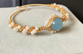 Sapphire Gleam Pearl Bracelet: Gilded Elegance - Bracelet