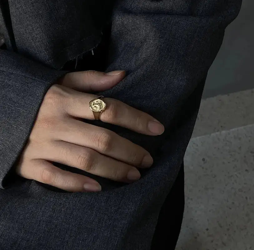 Sculpted Elegance: Artisanal Portrait Ring